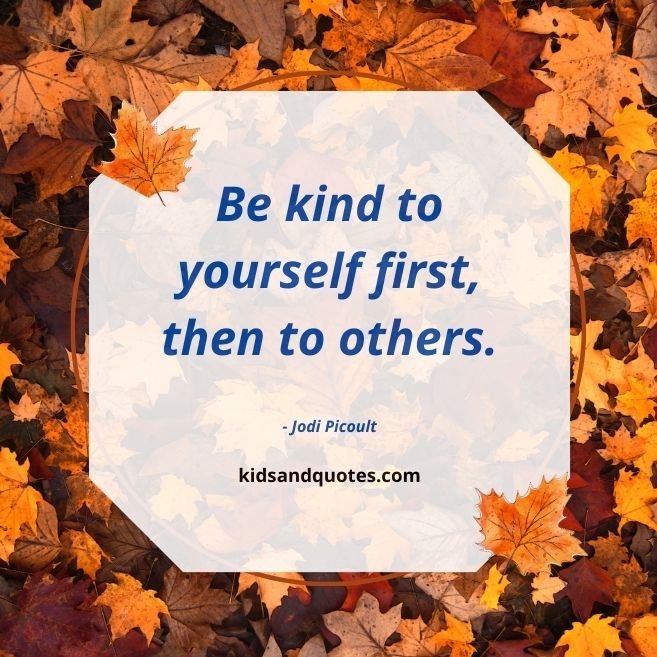 A short quote on kindness for kids on the background of beautiful leaves.