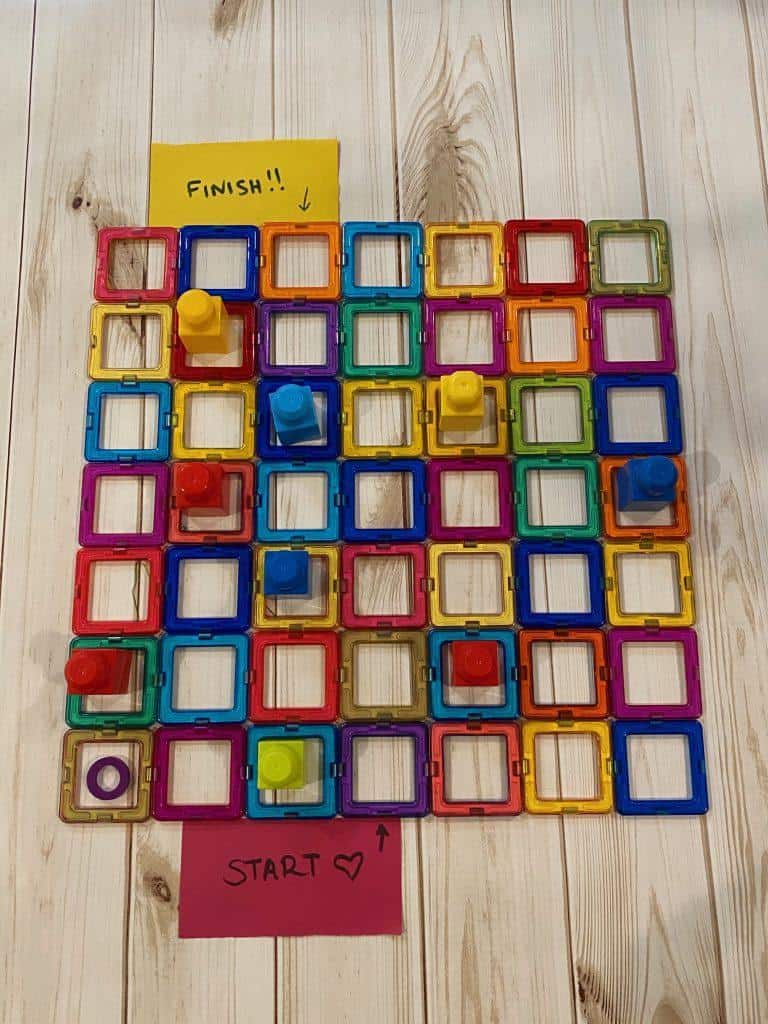 A no-screen coding grid for kids with Magnetic Tiles.