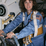 Christa McAuliffe, astronaut on the Challenger space shuttle training on treadmill for the mission.