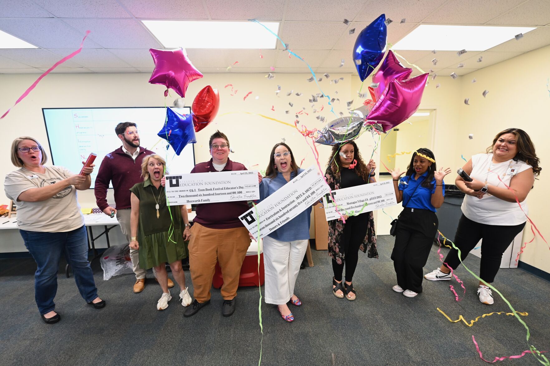 Teachers celebrating grant for the Killeen ISD curriculum.