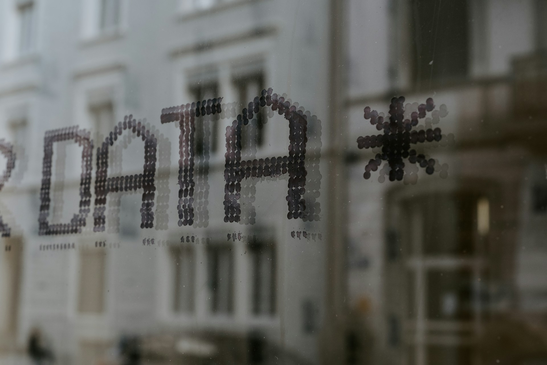 Data written as pixels on a glass.