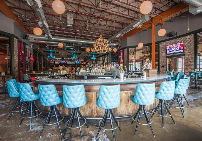 Seats in Punch Bowl Social, Denver.